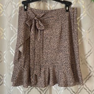 Cheetah print mini skirt with bow tie